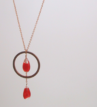 Red swirl teardrops with brass ring